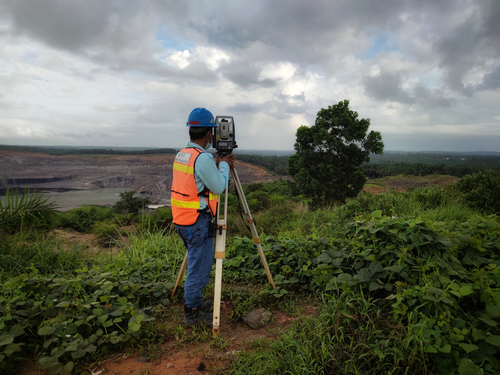 Topographic,survey,using,a,total,station,at,a,coal,mines.